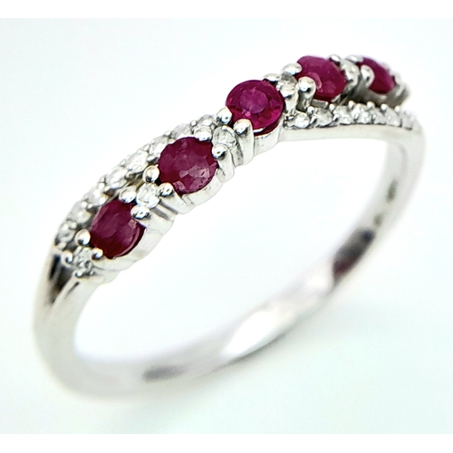 530 - A 9K WHITE GOLD DIAMOND & RUBY RING. Size O 1/2, 2.2g total weight. Ref: SC 8046