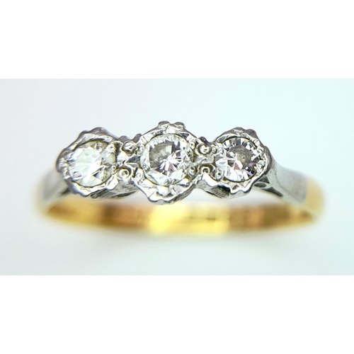 355 - A VINTAGE 18K YELLOW GOLD, PLATINUM AND DIAMOND 3 STONE RING. 0.15CT. 2.2G. SIZE O