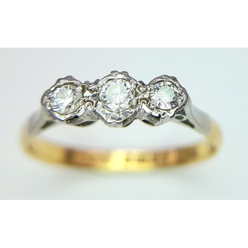 355 - A VINTAGE 18K YELLOW GOLD, PLATINUM AND DIAMOND 3 STONE RING. 0.15CT. 2.2G. SIZE O