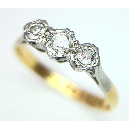 355 - A VINTAGE 18K YELLOW GOLD, PLATINUM AND DIAMOND 3 STONE RING. 0.15CT. 2.2G. SIZE O