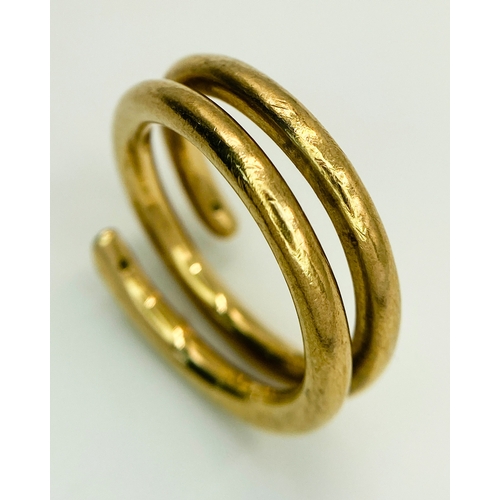 40 - A 9K YELLOW GOLD, SERPENT STYLE DIAMOND BAND RING. 10G.  SIZE T.