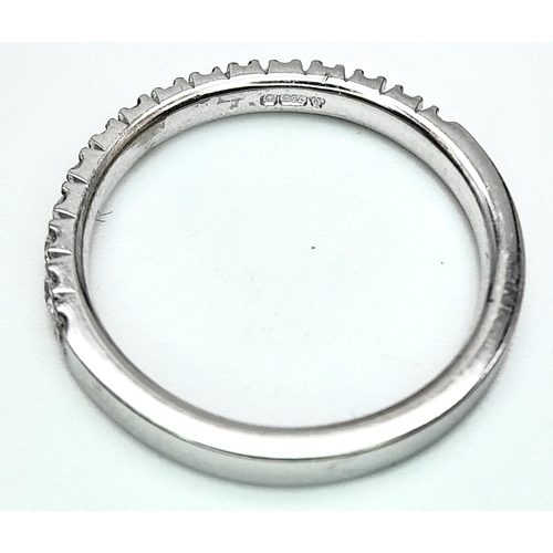 142 - AN 18K WHITE GOLD DIAMOND HALF ETERNITY RING. 0.50ctw, size L, 2.6g total weight. Ref: SC 8075