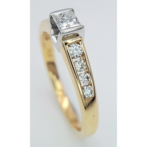 297 - An 18K Yellow Gold Princess Cut Diamond Ring. 0.30ct central diamond with four graduated round cut d... 