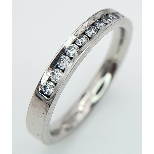 162 - A PLATINUM DIAMOND HALF ETERNITY RING. 0.25ctw, size J, 4.1g total weight. Ref: SC 9078