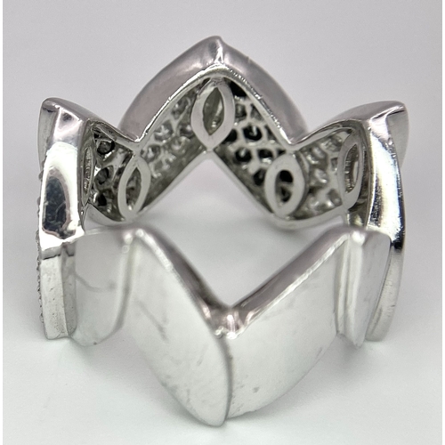 177 - AN 18K WHITE GOLD BLACK & WHITE DIAMOND SET RING. 0.80ctw, size N, 11.8g total weight.