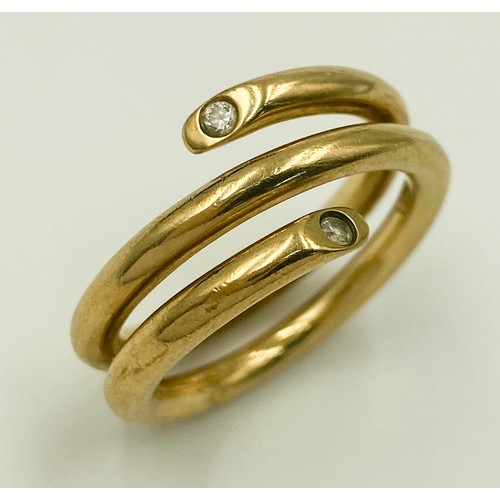 40 - A 9K YELLOW GOLD, SERPENT STYLE DIAMOND BAND RING. 10G.  SIZE T.