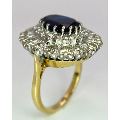 248 - A Breath-Taking 18K Yellow Gold, Sapphire and Diamond Dress Ring. Central oval cut 3ct sapphire with... 