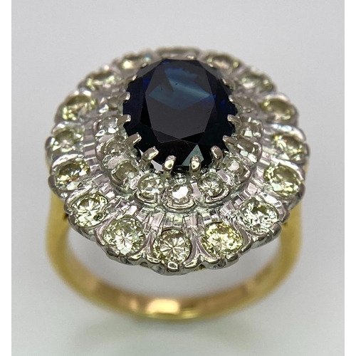 248 - A Breath-Taking 18K Yellow Gold, Sapphire and Diamond Dress Ring. Central oval cut 3ct sapphire with... 