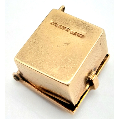 253 - A 9K YELLOW GOLD SAFE CHARM THAT OPENS. 1.5cm length, 3.2g weight. Ref: SC 8005