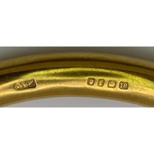 309 - A Lovely Vintage 18K Gold Large Bangle. 8cm inner diameter.
Fully UK hallmarked. 28.3g