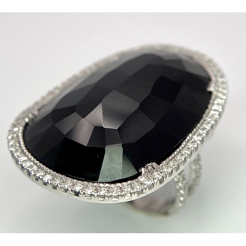 11 - A Beautiful 18k White Gold Black Onyx and Diamond Ladies Dress Ring. Faceted black onyx with a diamo... 