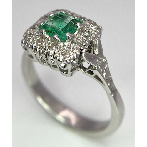 303 - Two Platinum Gemstone Rings. 0.50ct diamond solitaire - size L and an emerald with diamond surround ... 