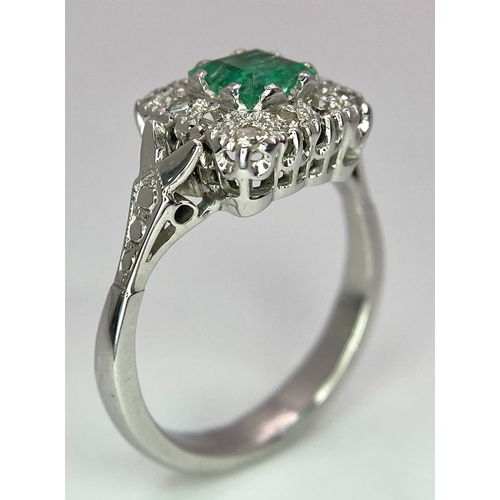 303 - Two Platinum Gemstone Rings. 0.50ct diamond solitaire - size L and an emerald with diamond surround ... 