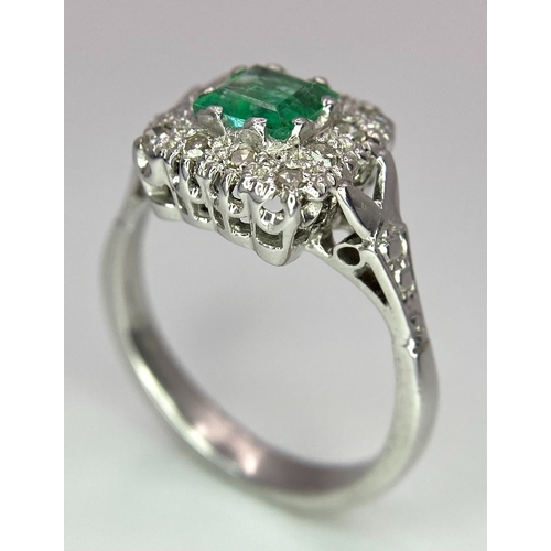 303 - Two Platinum Gemstone Rings. 0.50ct diamond solitaire - size L and an emerald with diamond surround ... 