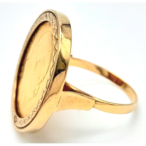 330 - A 9 K yellow gold ring with a full 1902 sovereign which is not welded to the ring and can easily be ... 