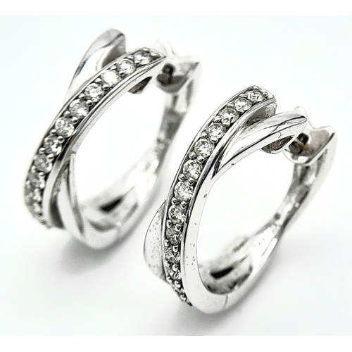 96 - A PAIR OF 14K WHITE GOLD DIAMOND EARRINGS. 0.35ctw, 1.6cm diameter, 4.8g total weight. Ref: SC 8052