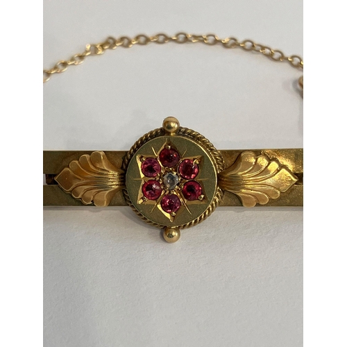 224 - Vintage 9 carat GOLD RUBY and DIAMOND BAR BROOCH. Complete with Gold safety chain. Presented in the ... 