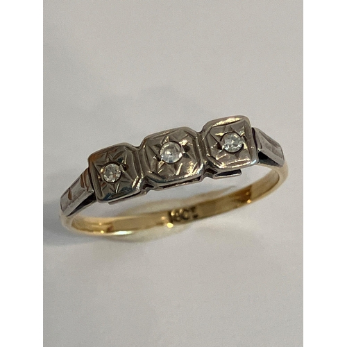 231 - 18 carat yellow GOLD RING set with 3 x DIAMONDS to top. 1.36 grams.  Size L - L 1/2.