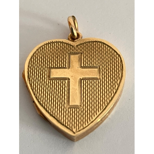 343 - Vintage 9 carat GOLD LOCKET.Front having attractive  engine turned design with GOLD CROSS MOTIF to c... 