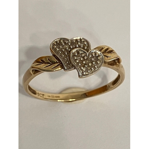 56 - Unusual and interesting 9 carat GOLD RING with 2 x DIAMOND ENCRUSTED HEARTS mounted to top. Attracti... 