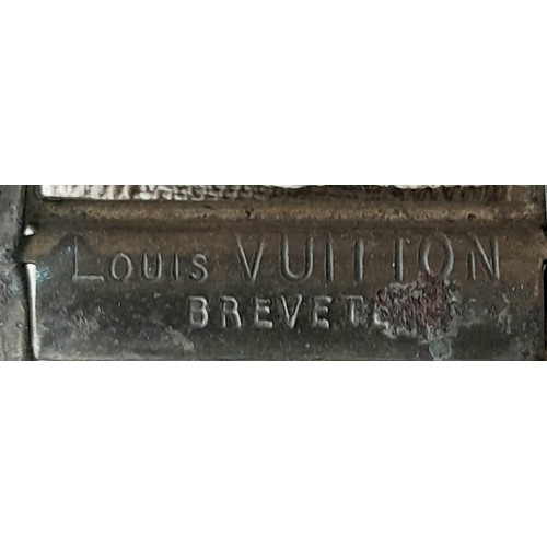 38 - A Vintage Possibly Antique Louis Vuitton Trunk/Hard Suitcase. Canvas monogram LV exterior with quatr... 