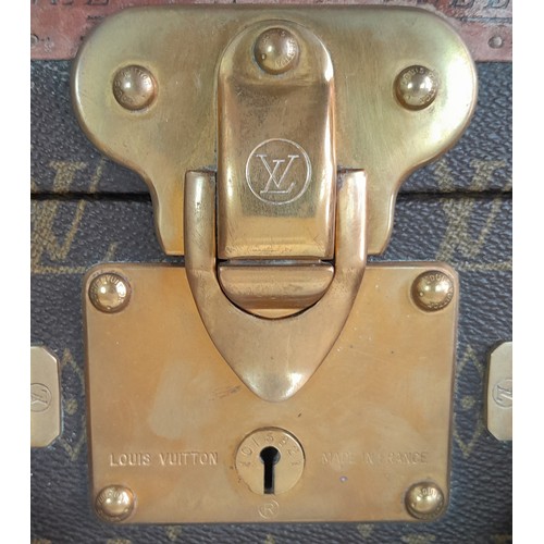 39 - A Vintage Possibly Antique Louis Vuitton Suitcase. The last lot of our LV trilogy. Canvas monogram L... 