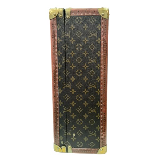 39 - A Vintage Possibly Antique Louis Vuitton Suitcase. The last lot of our LV trilogy. Canvas monogram L... 