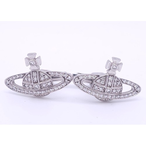 17 - A PAIR OF 18K WHITE GOLD (STAMPED & TESTED) DIAMOND SET VIVIENNE WESTWOOD CUFFLINKS. 2.5cm length, 1... 