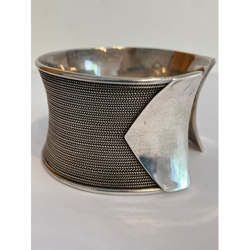 420 - SILVER CUFF BANGLE. Wide and chunky with herringbone inlaid design. Marking for 925 Silver BA. Appro... 