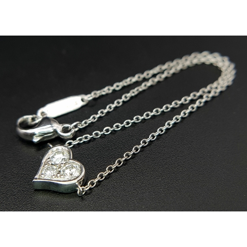 18 - A 950 Platinum Delicate Tiffany and Co. Diamond Heart Bracelet. 16cm. 2.35g total weight. Ref: 01543... 