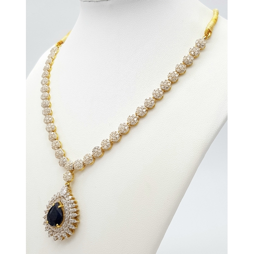 312 - A Fabulous Jewellery Lot! A 21K Rich Yellow Gold Diamond and White Stone (one missing) Necklace with... 