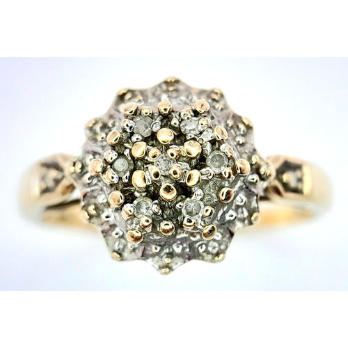 603 - A 9K YELLOW GOLD DIAMOND CLUSTER RING. Size N, 2.1g total weight. Ref: SC 8012