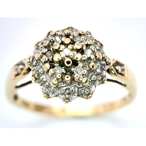 603 - A 9K YELLOW GOLD DIAMOND CLUSTER RING. Size N, 2.1g total weight. Ref: SC 8012