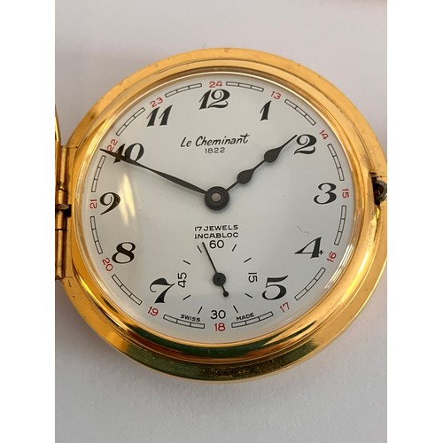 462 - Le CHEMINANT Gilded HALF HUNTER POCKET WATCH.Having gilded chain with clasp and T-bar. Manual windin... 