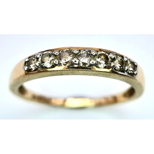 589 - A 9K YELLOW GOLD DIAMOND SET BAND RING. 0.25ctw, Size N, 1.8g total weight. Ref: SC 8007