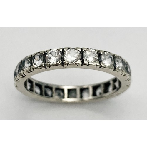 698 - A VINTAGE 9K WHITE GOLD (TESTED) DIAMOND FULL ETERNITY RING. 2.5G.  SIZE 0.