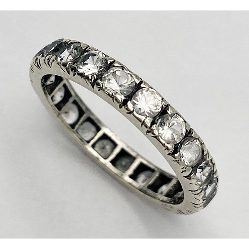 698 - A VINTAGE 9K WHITE GOLD (TESTED) DIAMOND FULL ETERNITY RING. 2.5G.  SIZE 0.