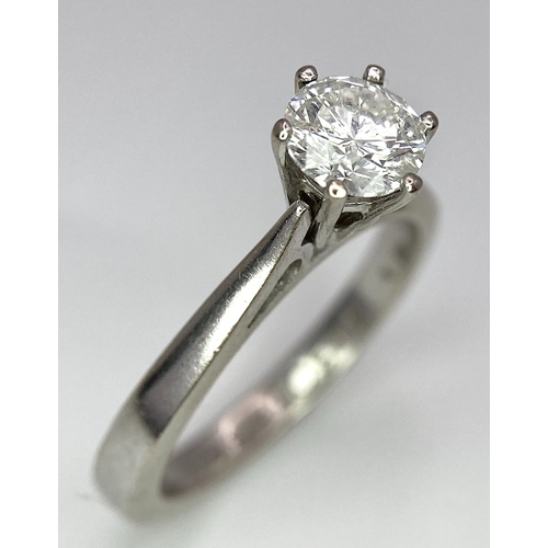 5 - AN 18K WHITE GOLD DIAMOND SOLITAIRE RING -  BRILLIANT ROUND CUT 0.70CT. 4.2G. SIZE M