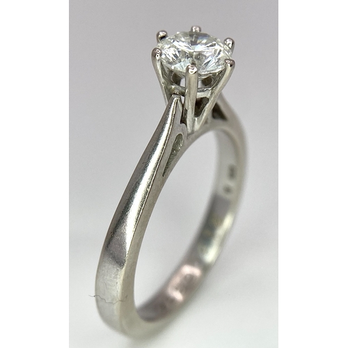 5 - AN 18K WHITE GOLD DIAMOND SOLITAIRE RING -  BRILLIANT ROUND CUT 0.70CT. 4.2G. SIZE M