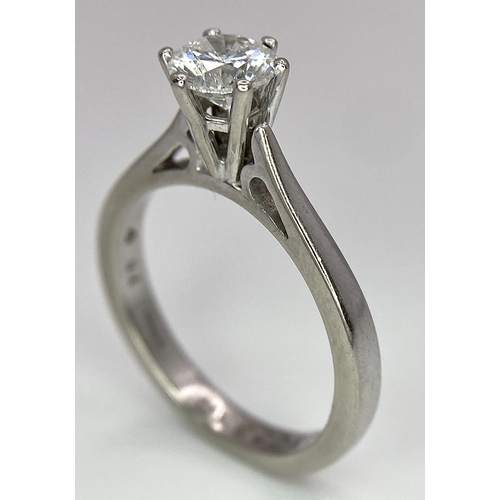 5 - AN 18K WHITE GOLD DIAMOND SOLITAIRE RING -  BRILLIANT ROUND CUT 0.70CT. 4.2G. SIZE M