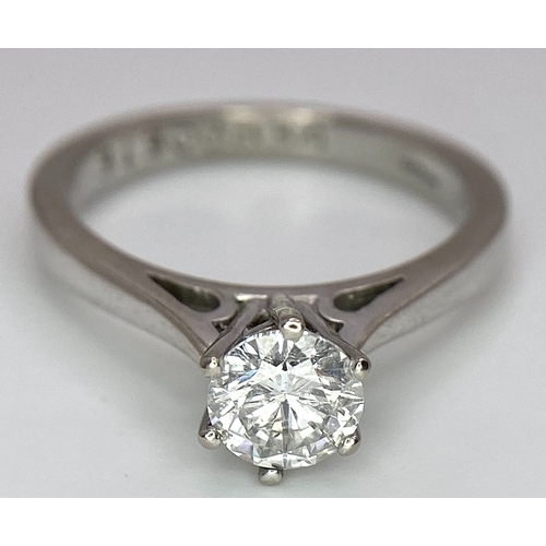 5 - AN 18K WHITE GOLD DIAMOND SOLITAIRE RING -  BRILLIANT ROUND CUT 0.70CT. 4.2G. SIZE M