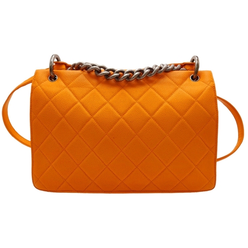 6 - A Chanel Orange Quilted Caviar Leather Retro Shoulder Bag. Front flap with CC turn-lock and detachab... 