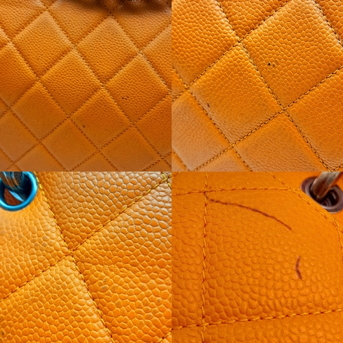 6 - A Chanel Orange Quilted Caviar Leather Retro Shoulder Bag. Front flap with CC turn-lock and detachab... 