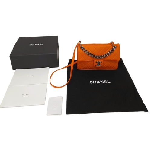 6 - A Chanel Orange Quilted Caviar Leather Retro Shoulder Bag. Front flap with CC turn-lock and detachab... 