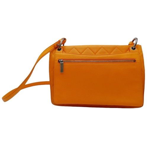 6 - A Chanel Orange Quilted Caviar Leather Retro Shoulder Bag. Front flap with CC turn-lock and detachab... 