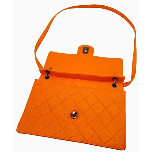 6 - A Chanel Orange Quilted Caviar Leather Retro Shoulder Bag. Front flap with CC turn-lock and detachab... 