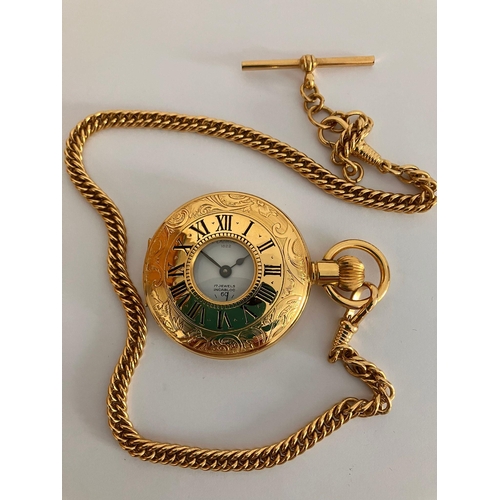 462 - Le CHEMINANT Gilded HALF HUNTER POCKET WATCH.Having gilded chain with clasp and T-bar. Manual windin... 