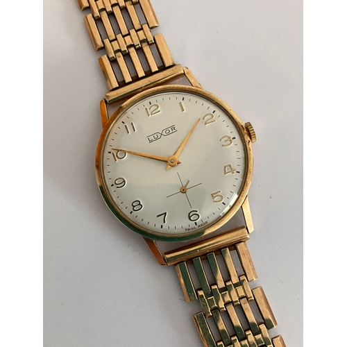 476 - Gentleman’s vintage 14 carat GOLD LUXOR WRISTWATCH. Having white face with  gold hands and digits. S... 