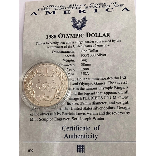 504 - 1988 OLYMPIC SILVER DOLLAR. Condition very fine ,appears a little dirty inside capsule. Complete wit... 