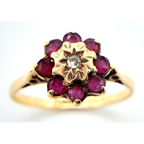 624 - A 9K YELLOW GOLD DIAMOND & RUBY CLUSTER RING. Size M, 1.7g total weight. Ref: SC 8015